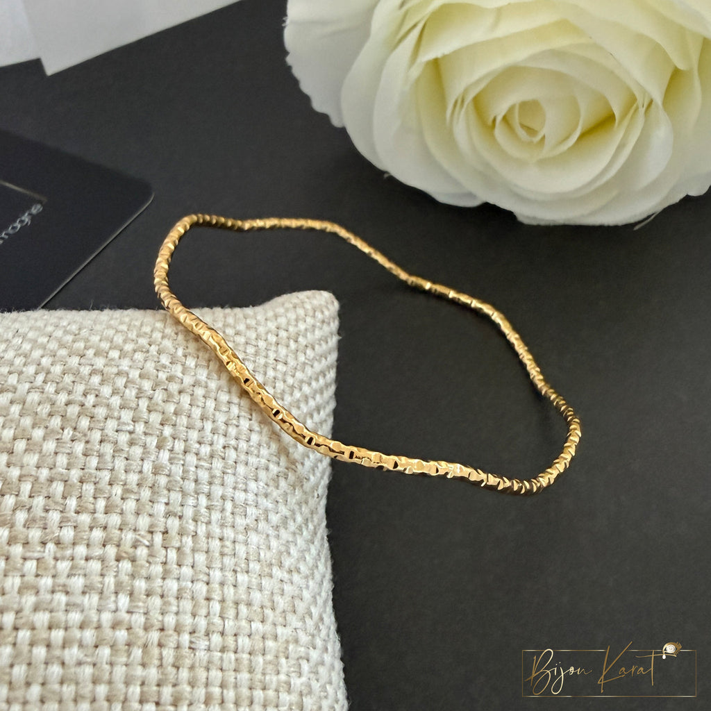Ajda Armreif Wellen Edelstahl 18K vergoldet Größe 64 mm
